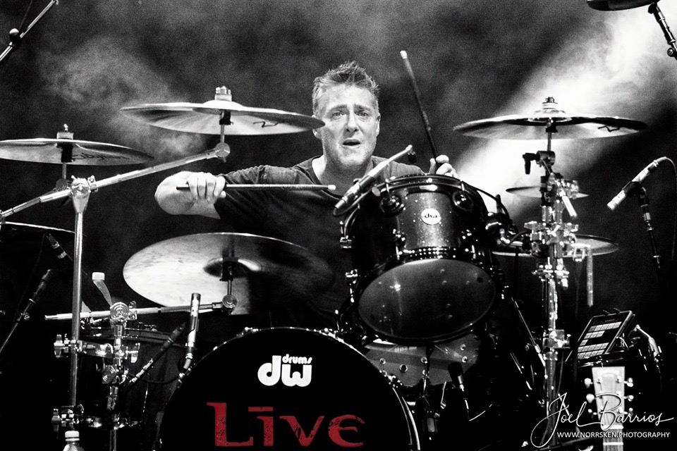 Chad Gracey performing live on drums
